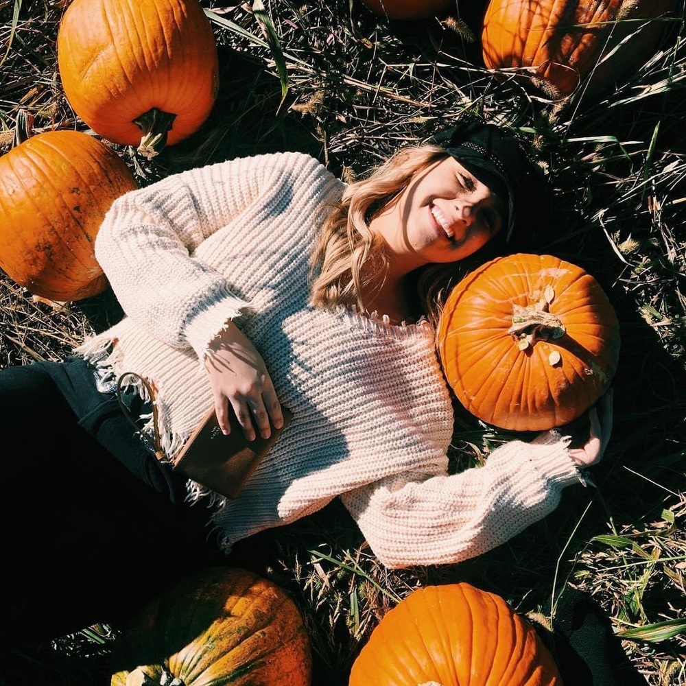 Distressed cropped V-neck sweater